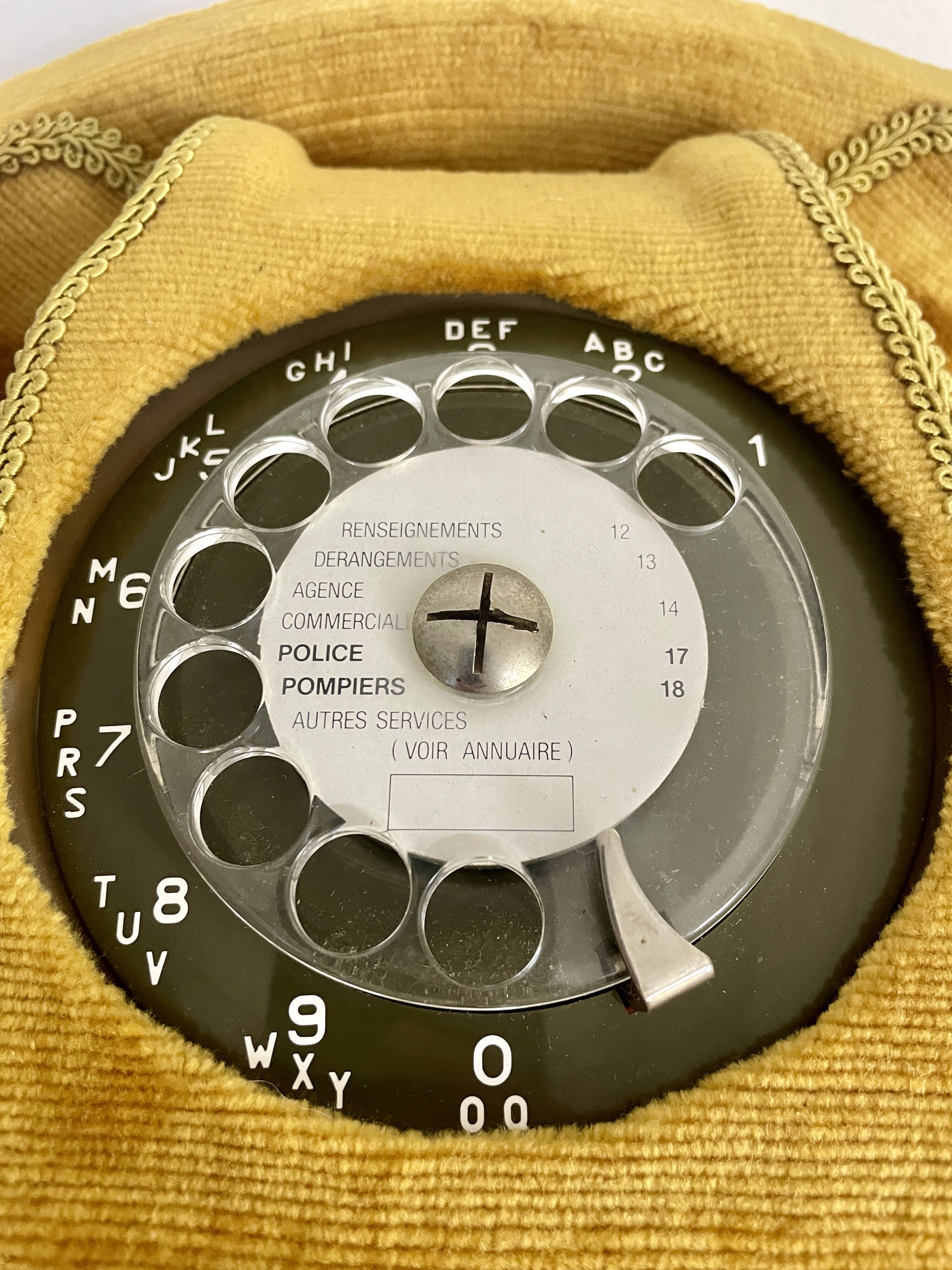 Socotel S63 telephone with its gold velvet shell