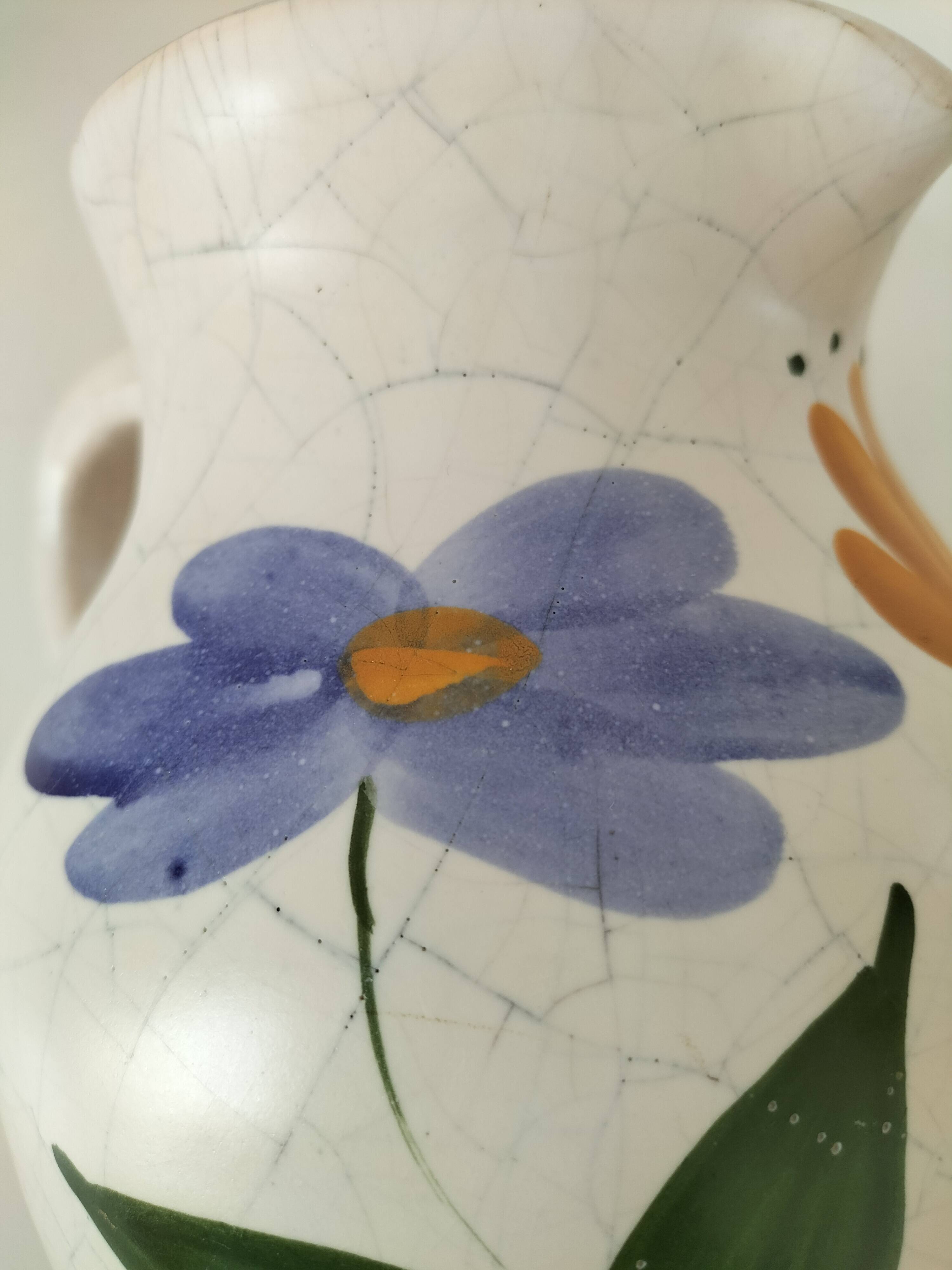 Vintage pitcher with floral decoration in the style of Poterie du Marais