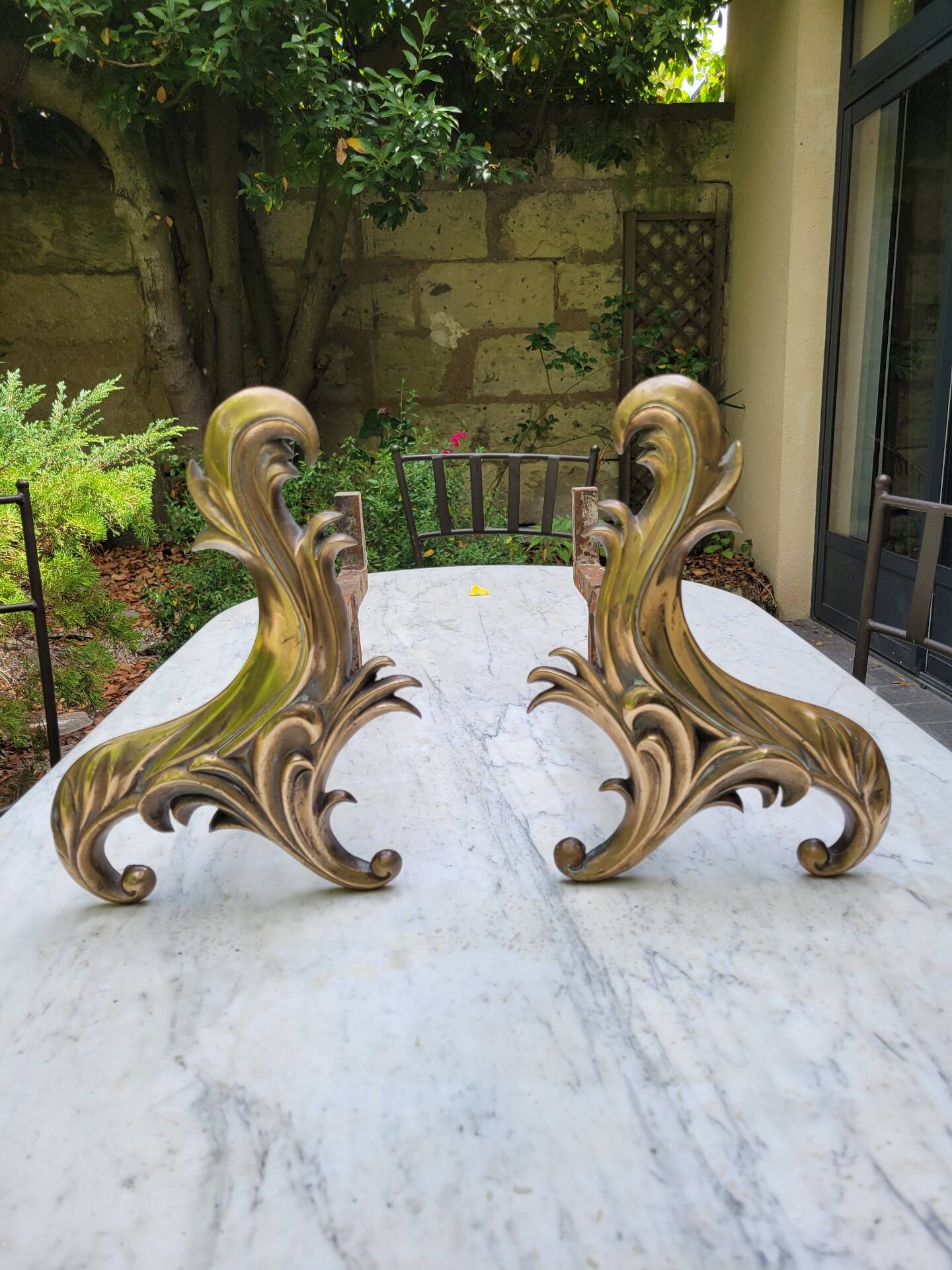 Gilded bronze chenets from the 19th century