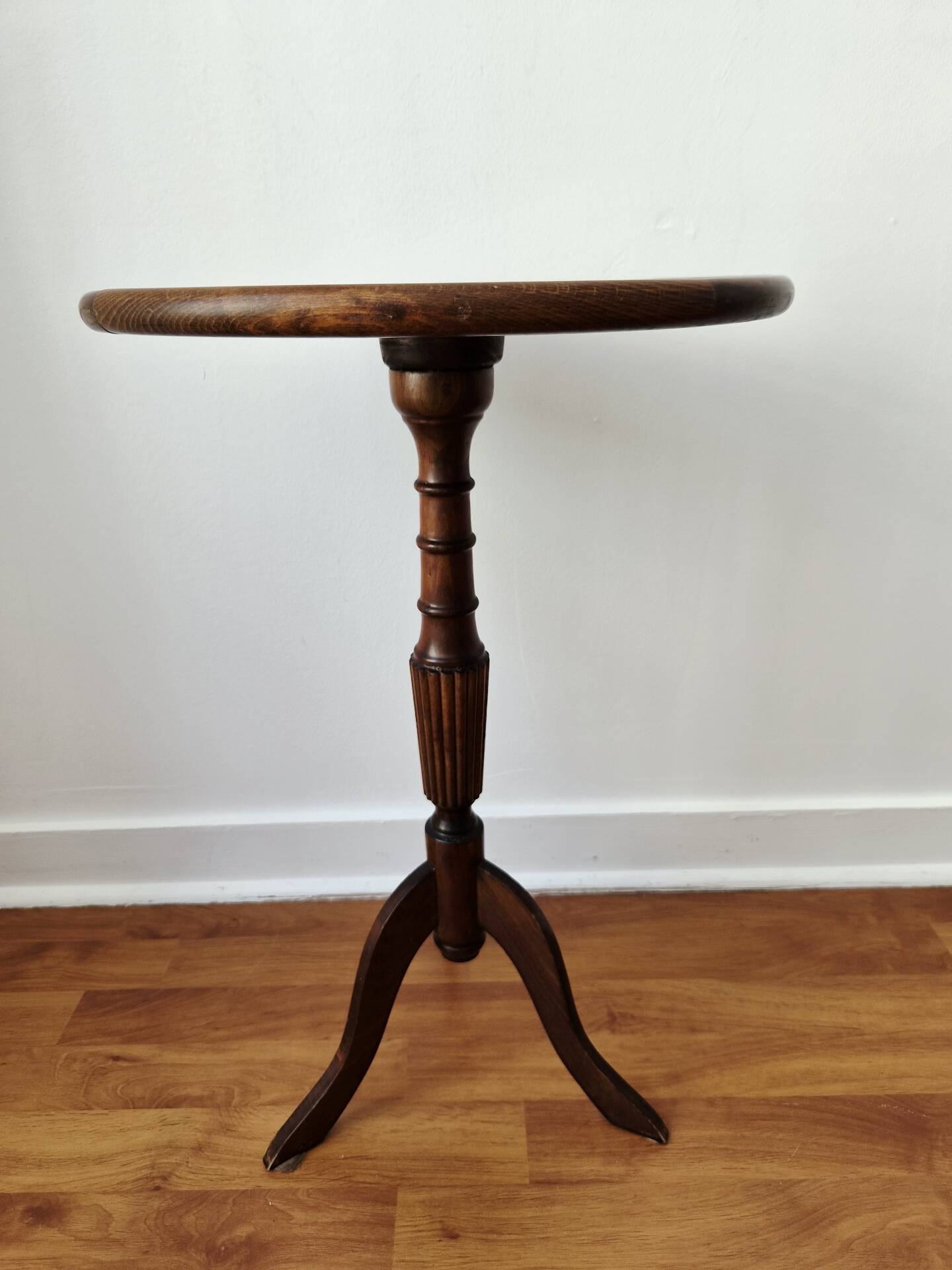 Small tripod wooden table with a vintage round top -