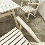 Garden furniture table and 4 armchairs 60's in its juice