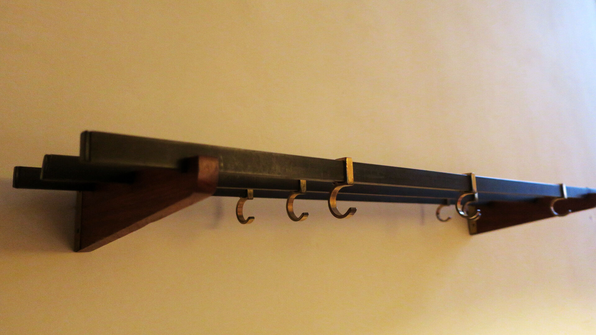 Teak, brass and black metal coat and hat rack, 1960
