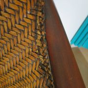 Woven rattan armchair and exotic wood in colonial style, 1980s.