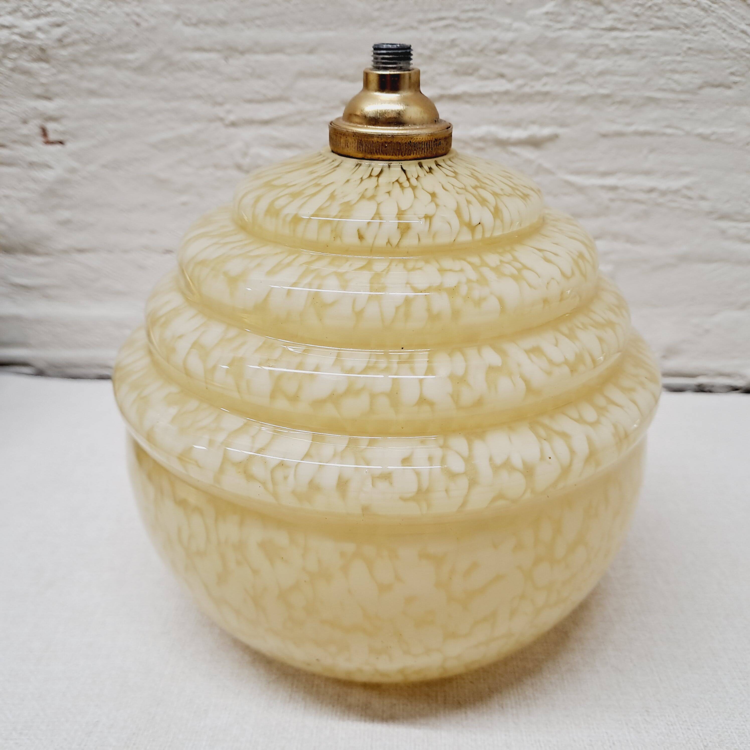 Pale yellow clichy glass globe