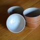 Lot of 4 bowls in sandstone and shiny grey inside