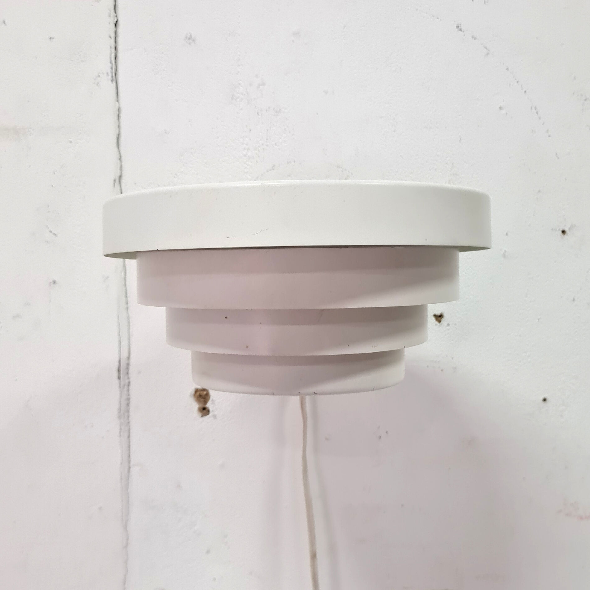 Minimalist wall lamp by Raak, Netherlands 1950s
