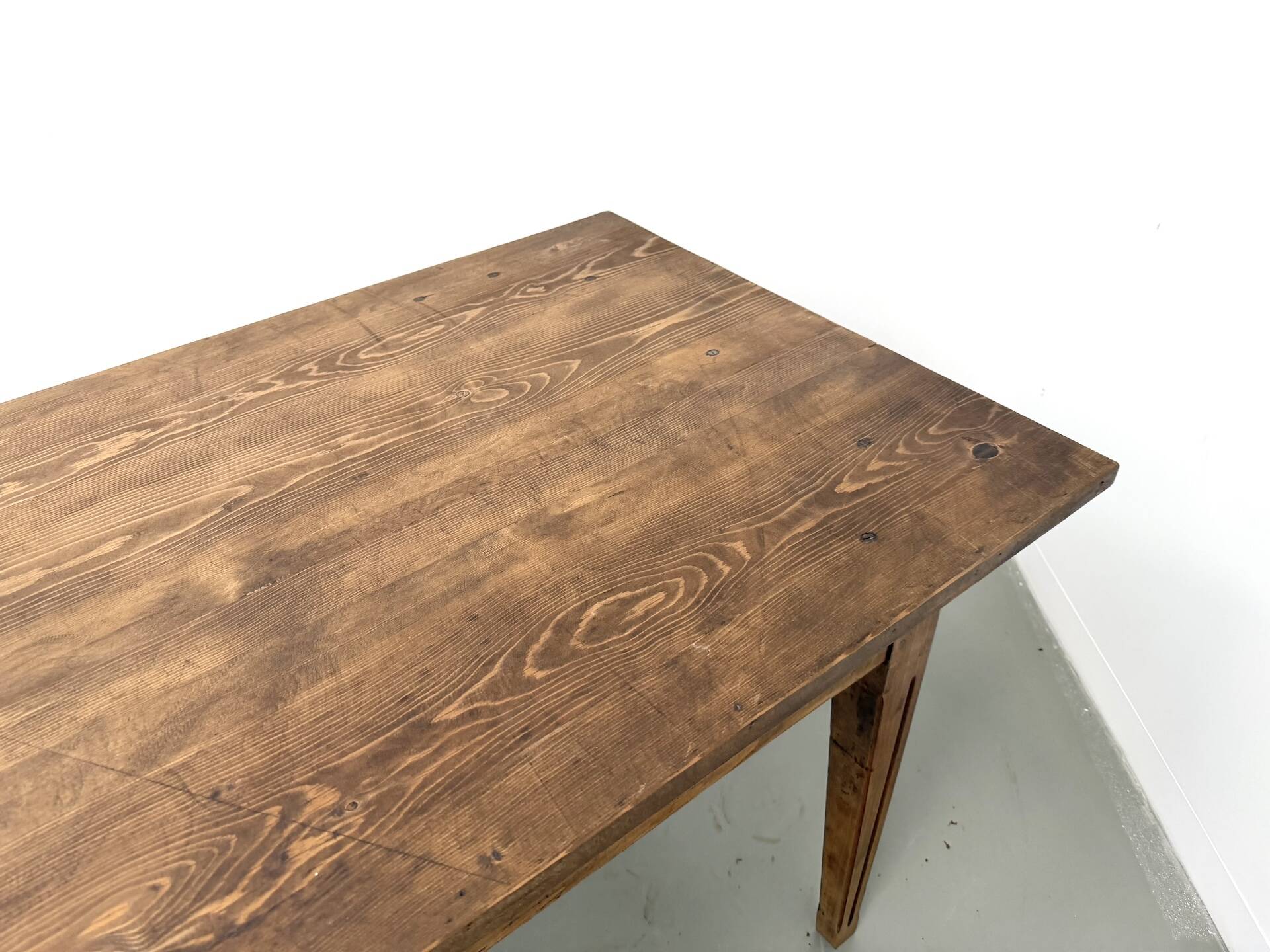 Solid pine farmhouse table, two drawers, fluted legs, France.