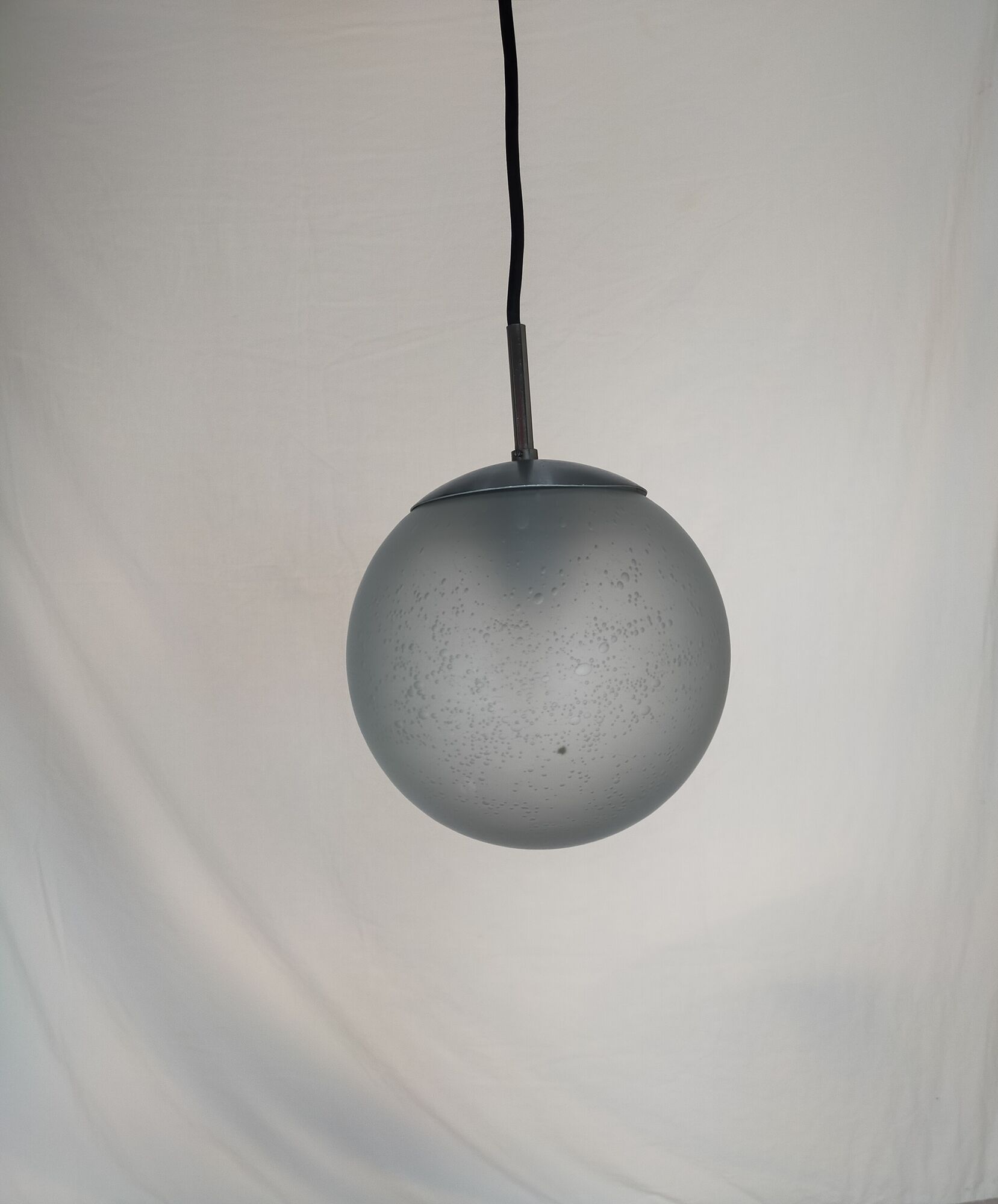 Suspension in blown and sandblasted glass, by Raak, from the 70s