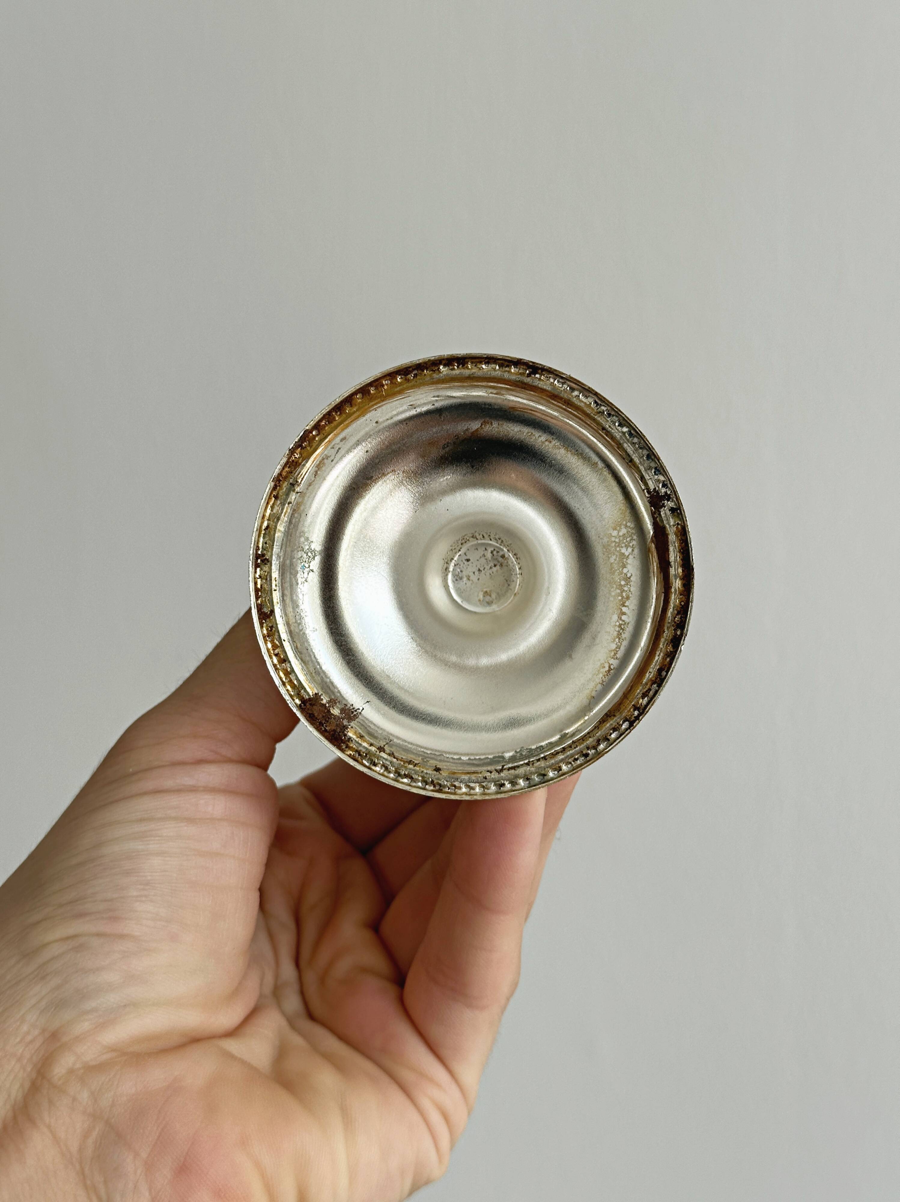 Pair of lightweight silver metal candlesticks