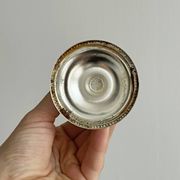 Paire de bougeoirs en métal léger argenté