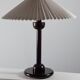 Vintage table in postmodern Art Deco revival with pleated lampshade.