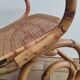 Vintage rocking chair in rattan and cane.