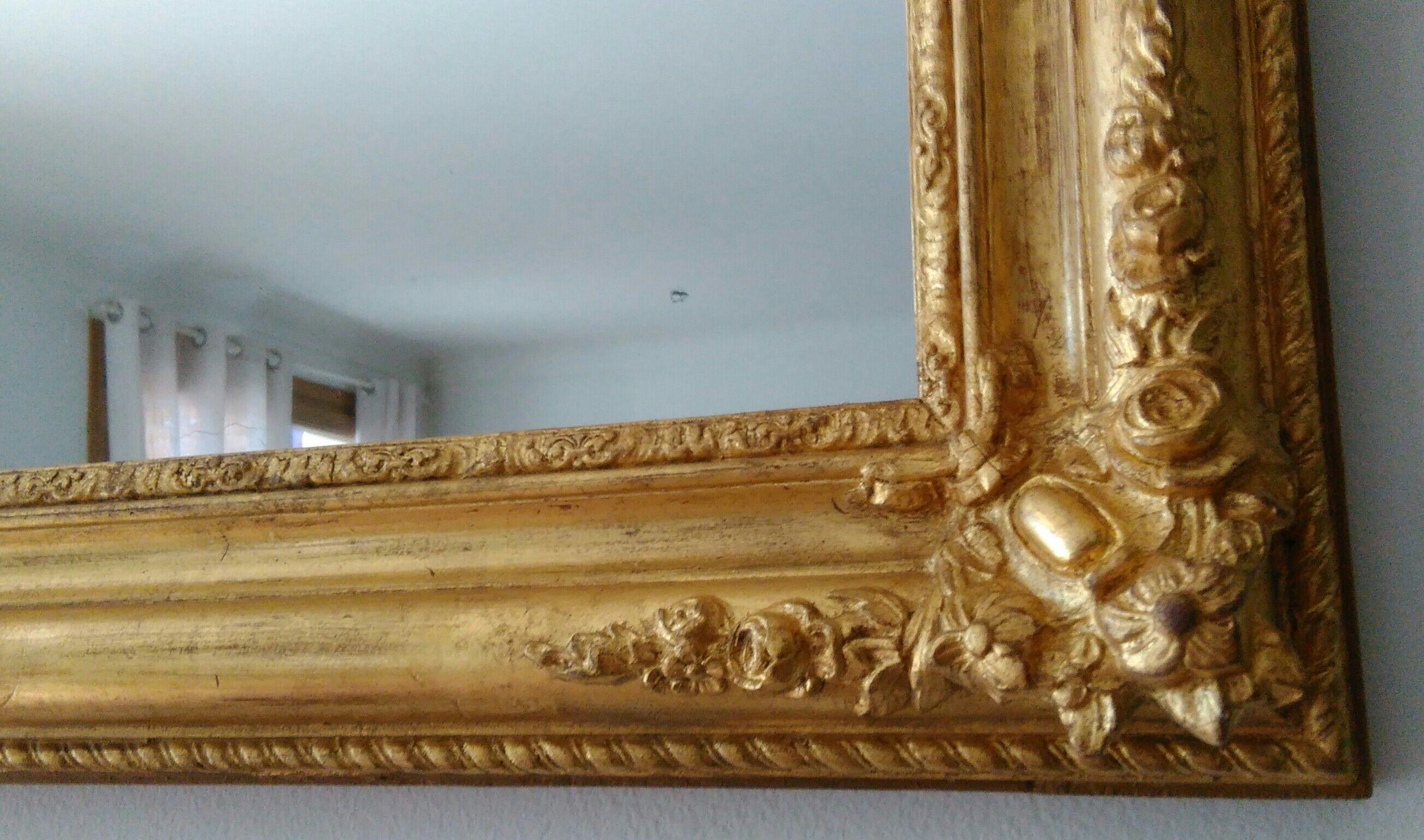 Golden romantic mirror with gold leaf
