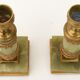 Pair of small candlesticks in golden brass and onyx