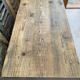 Vintage wooden table with a cast iron base.