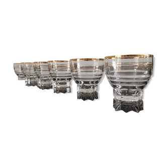 6 transparent glass cups with gold edging