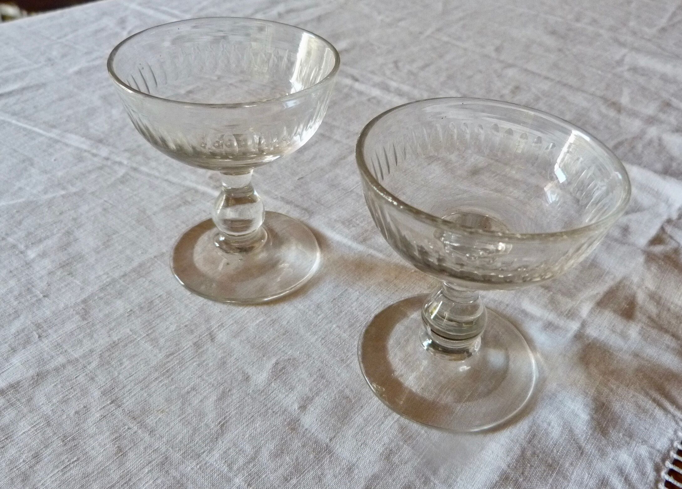 Set of 2 old foot glasses for liqueur