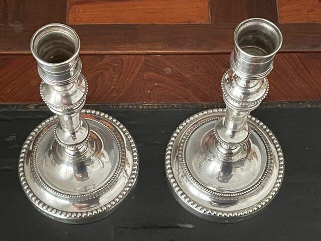 Pair of Christofle silver metal candle holders.
