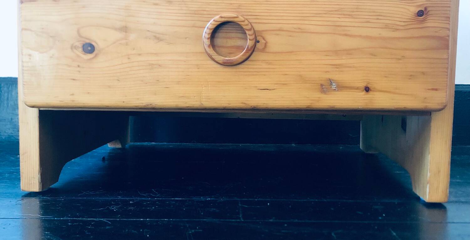 Bedside table assigned to Charlotte Perriand for Les Arcs, in pine, circa 1960.