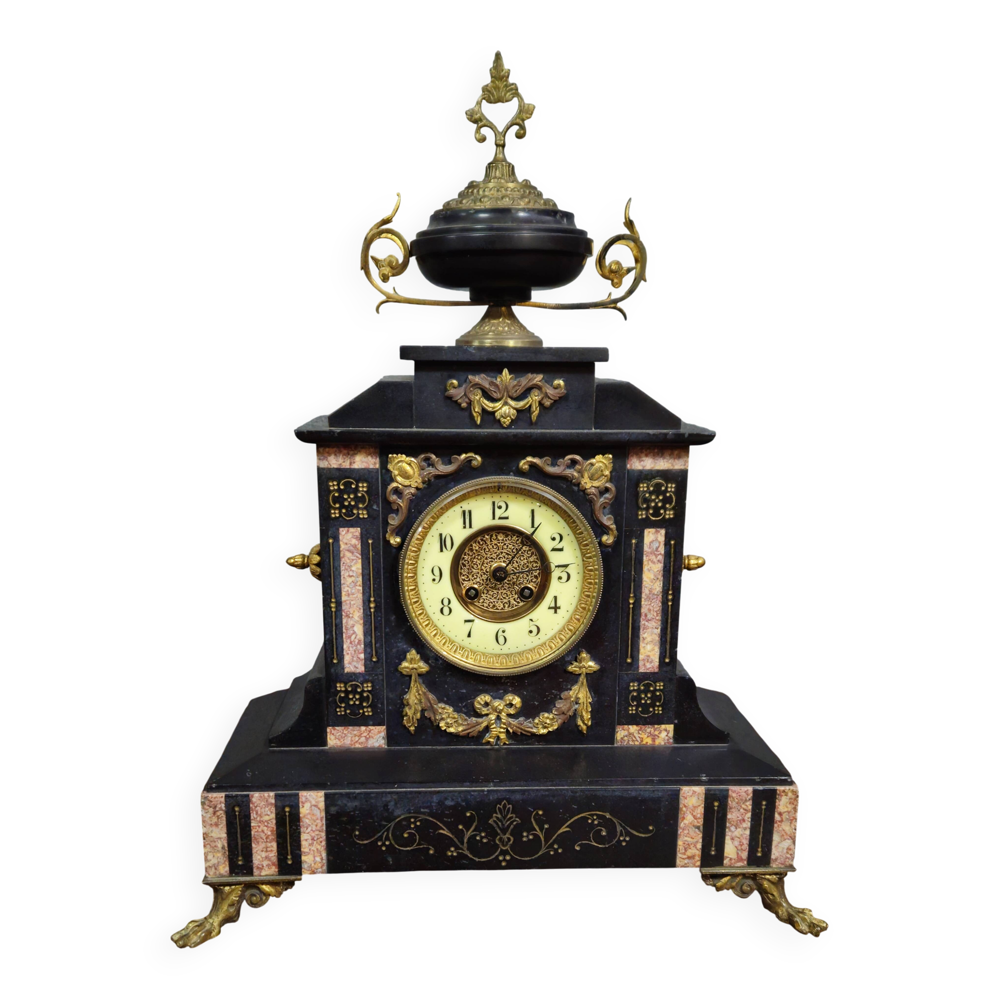 Large notary clock in black marble and gilded bronze.