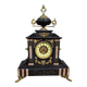 Large notary clock in black marble and gilded bronze.