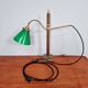 Bronze desk lamp with a green opaline conical shade, 1920.
