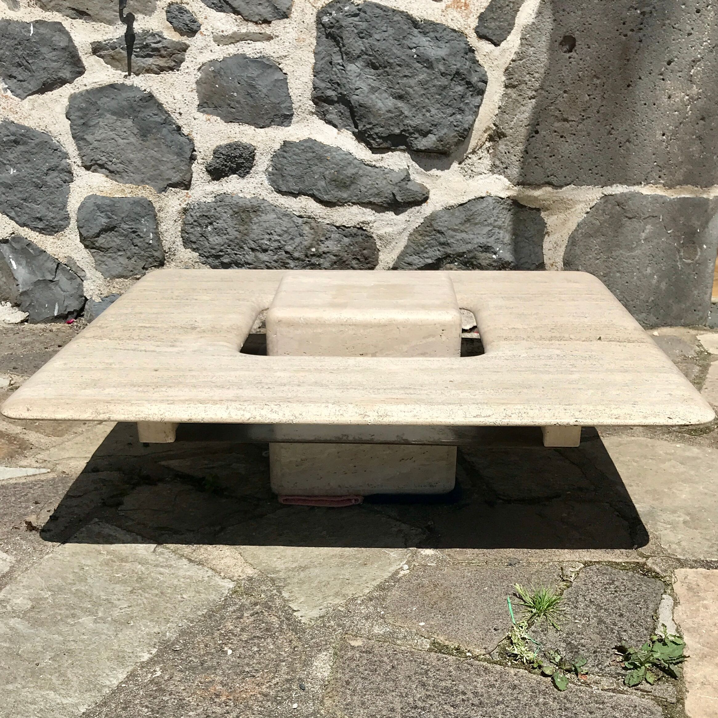 Sculptural travertine coffee table