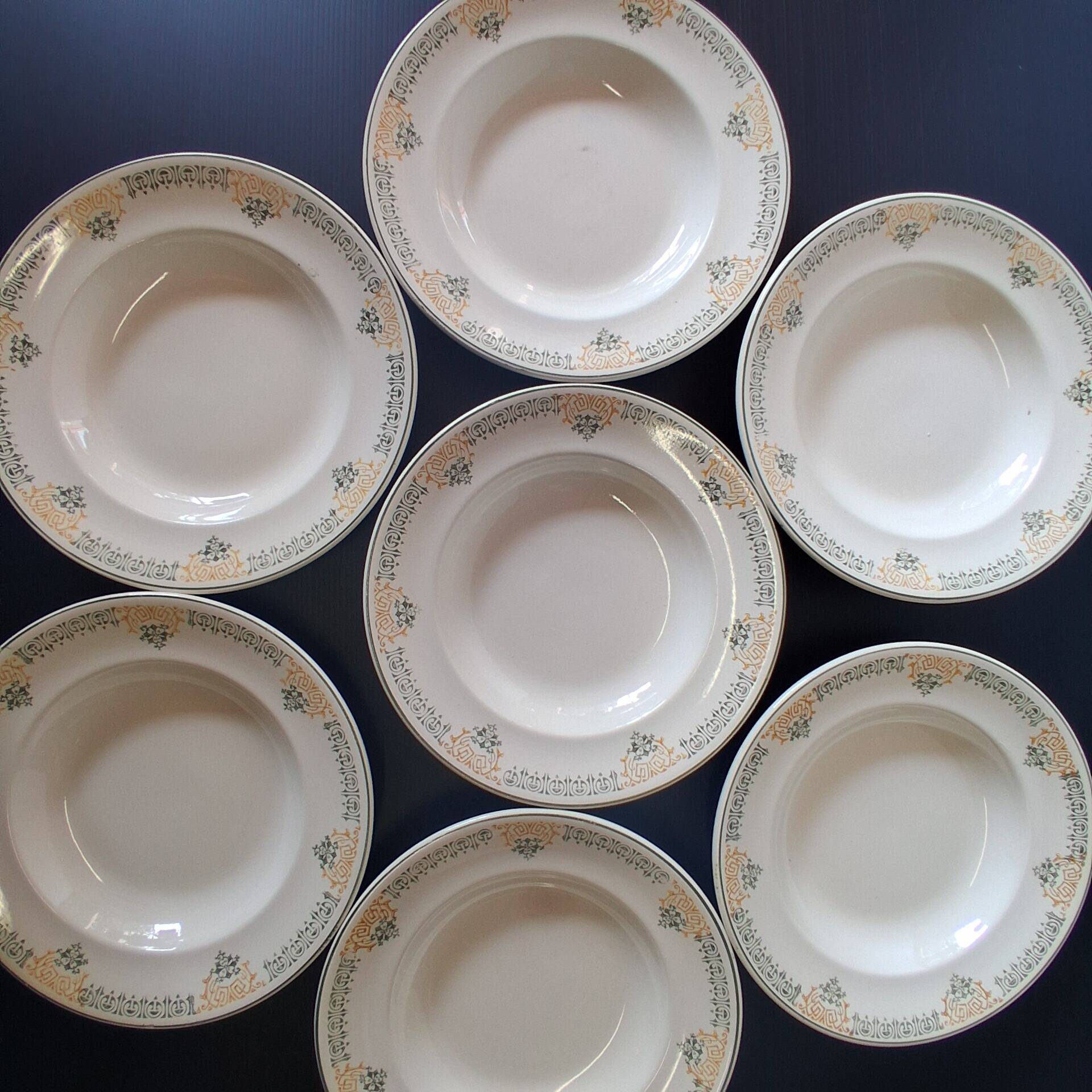Set of 7 antique deep plates from Longwy, "Savigny" model, in good condition.
