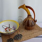 Glass and wicker decanter
