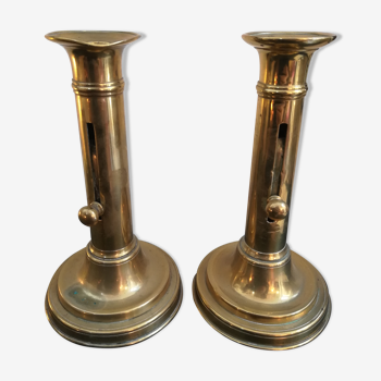 Duo of brass candle holders