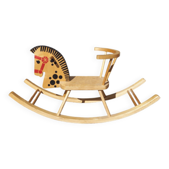 Cheval à bascule en bois
