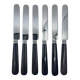 Set of 6 round-tipped dessert knives with dark wood, Nilox blade.