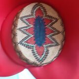 Oval basket in multi-colored straw;