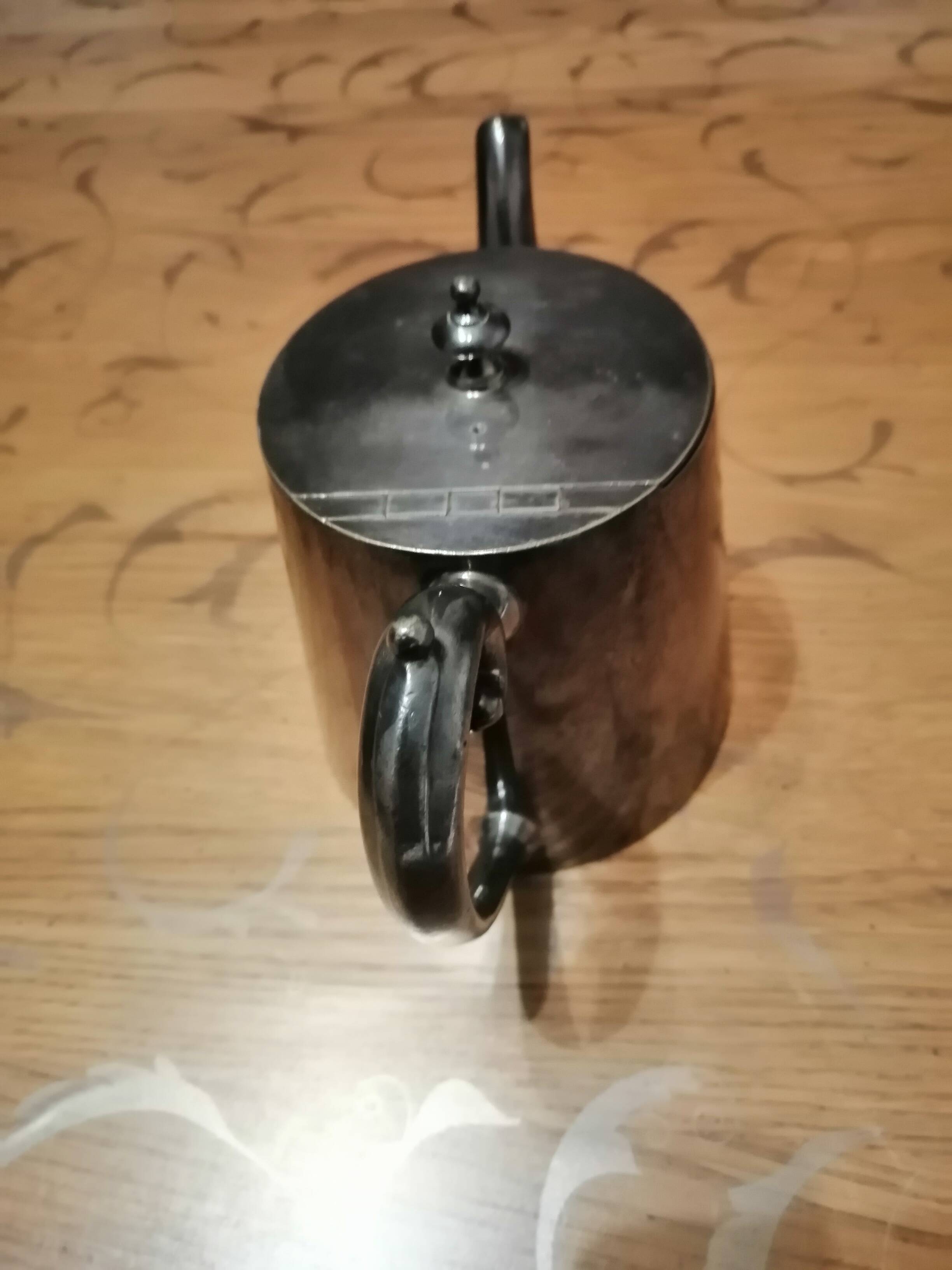 silver-plated teapot