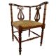 Fauteuil de coin à dossier lyre, vers 1900
