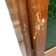 Vintage wooden display cabinet with green glass.