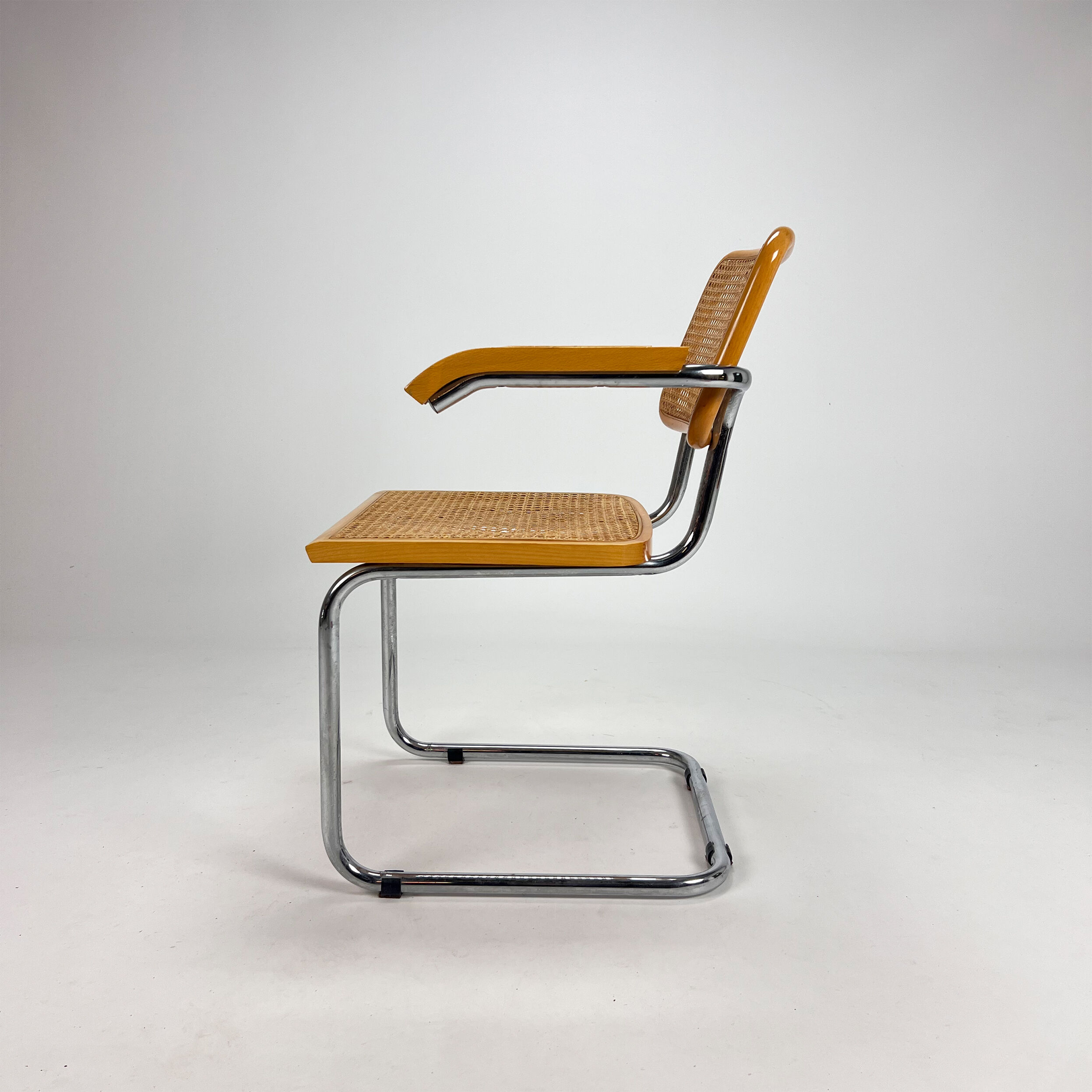 Tubular frame and cane cantilever dining chair, italy, 1970s