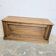 Antique wooden chest with moulded panels