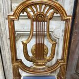 Paire de chaises style Louis XVI en bois doré
