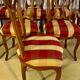 12 chairs in oak, carved wood with fleurette decorations, fabric seat