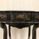 Worker Napoleon III, black lacquered wood with Asian decoration painted gold