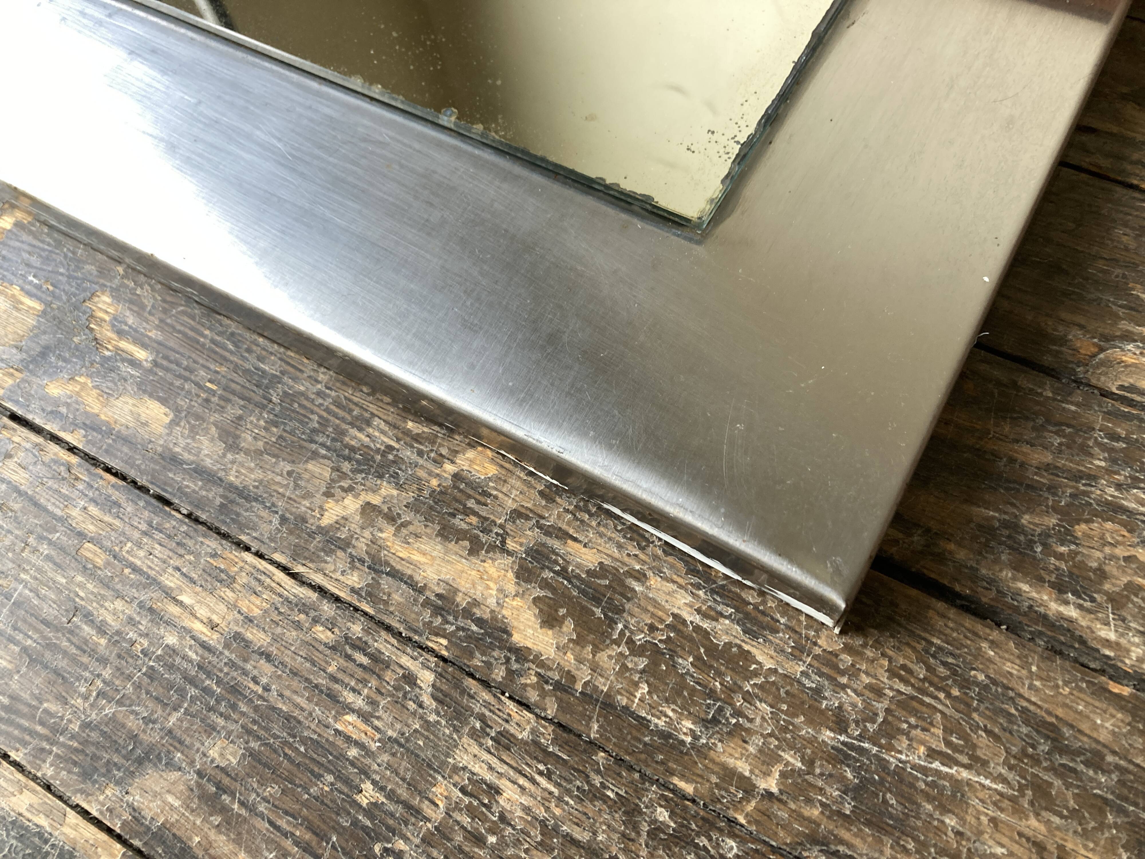 1970s space age steel mirror