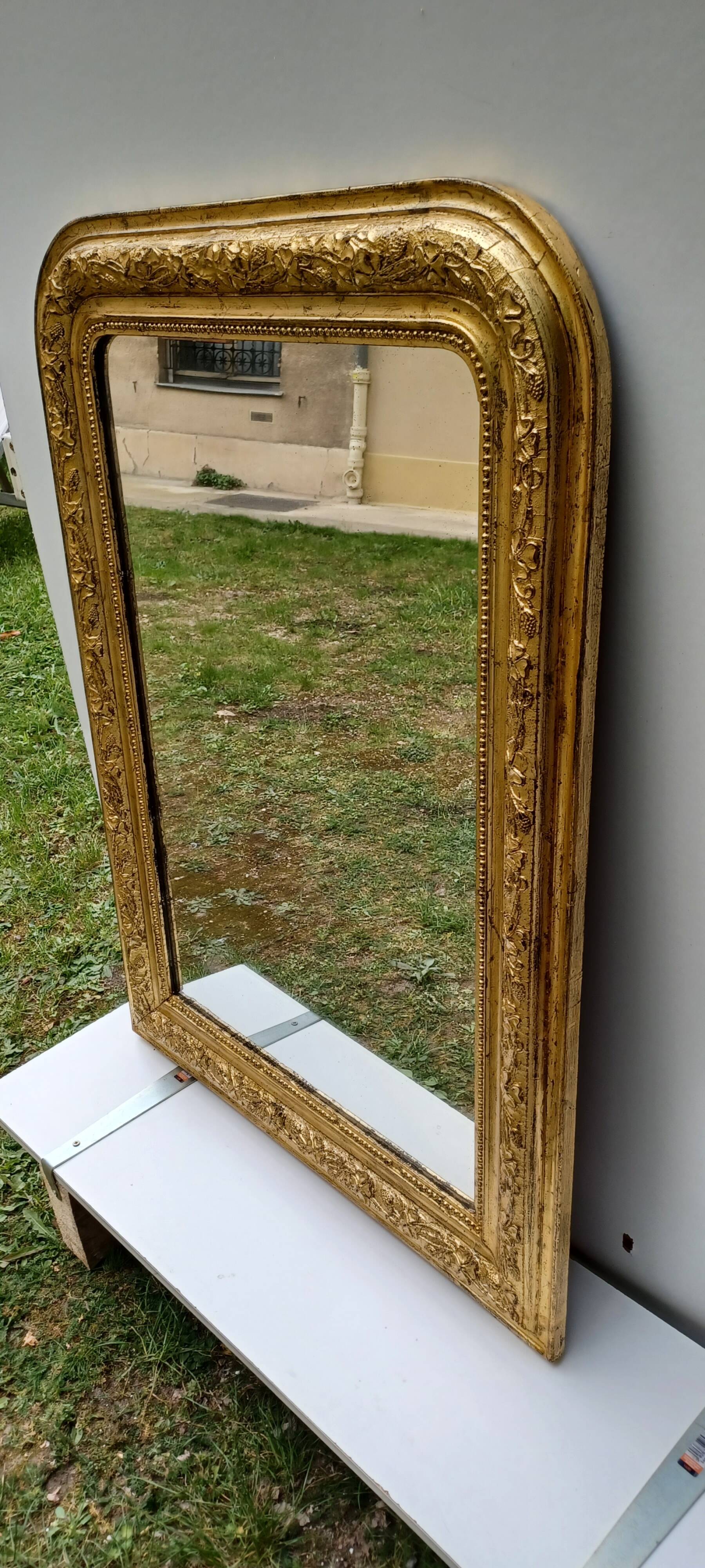 Golden mirror in louis-philippe style around 1870