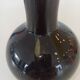 Iridescent black vase signed by the Phoenician Malta