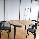 Antique extendable round table with Louis XV style extension
