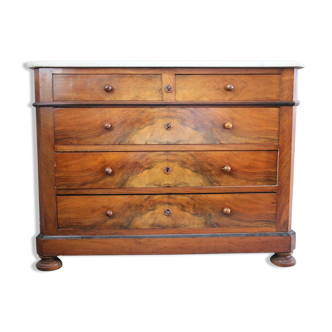 Chest of drawers early XIX ° in walnut magnifying glass and blackened pear tree