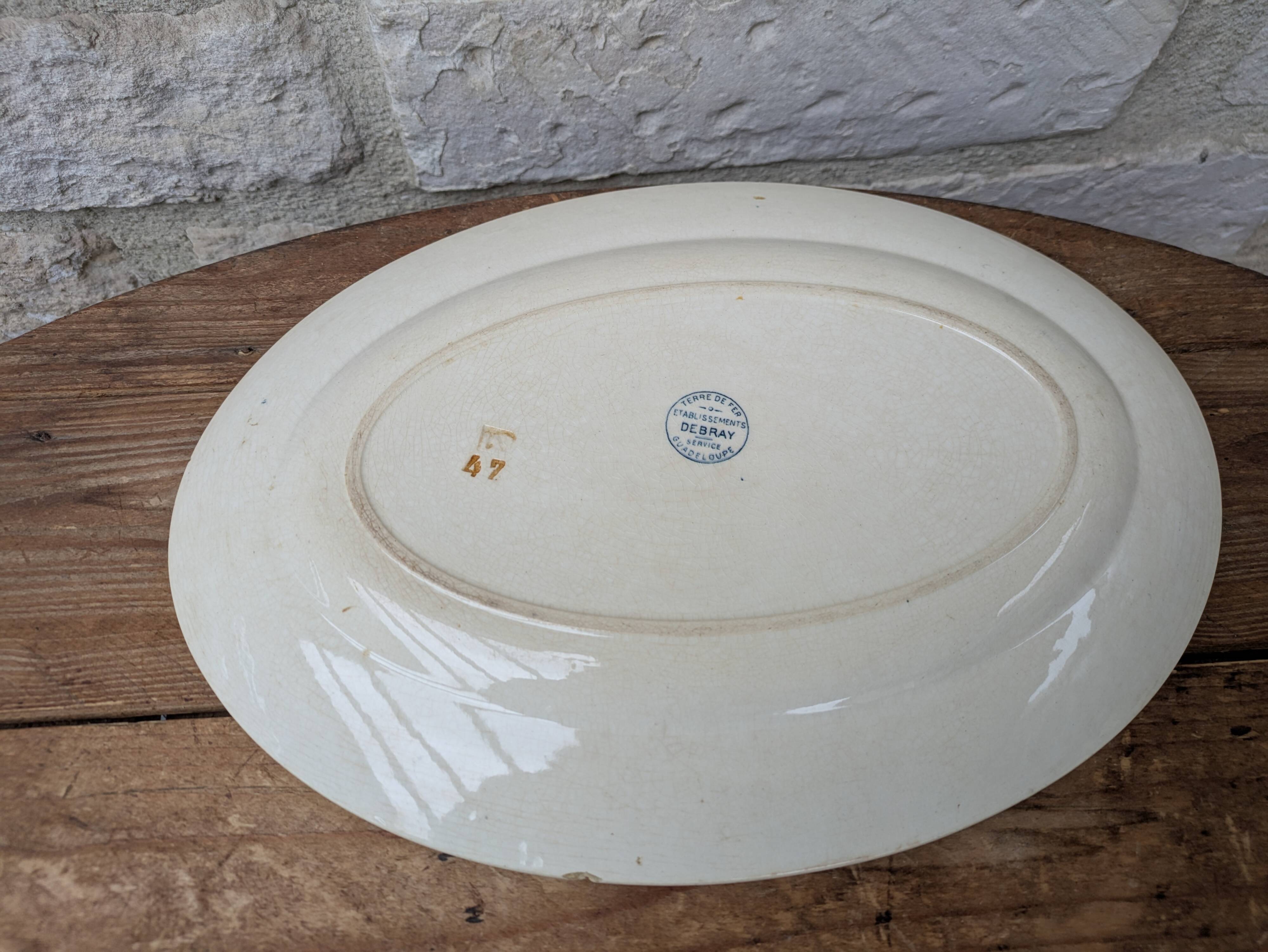 Old oval ironstone serving dish from Debray, Guadeloupe service