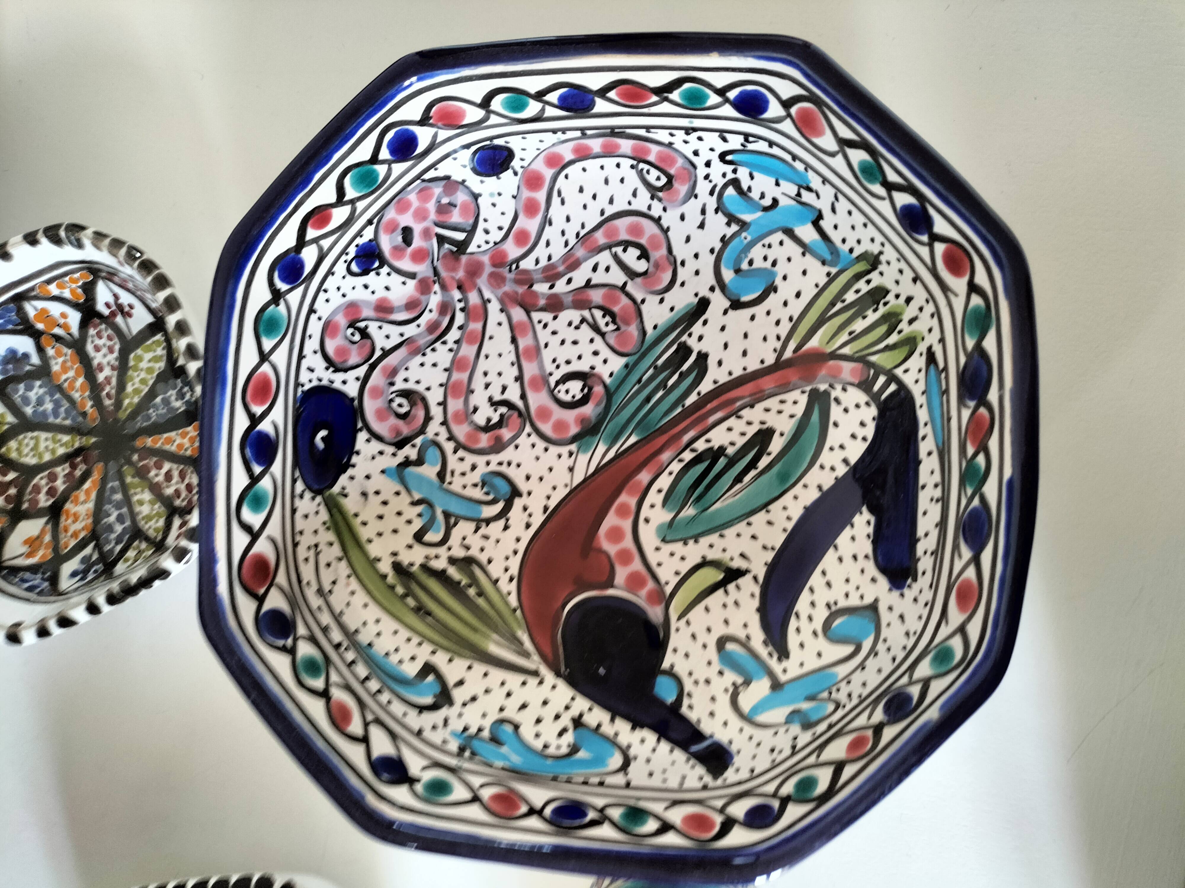 Set of 9 hand-painted Tunisian ceramics.