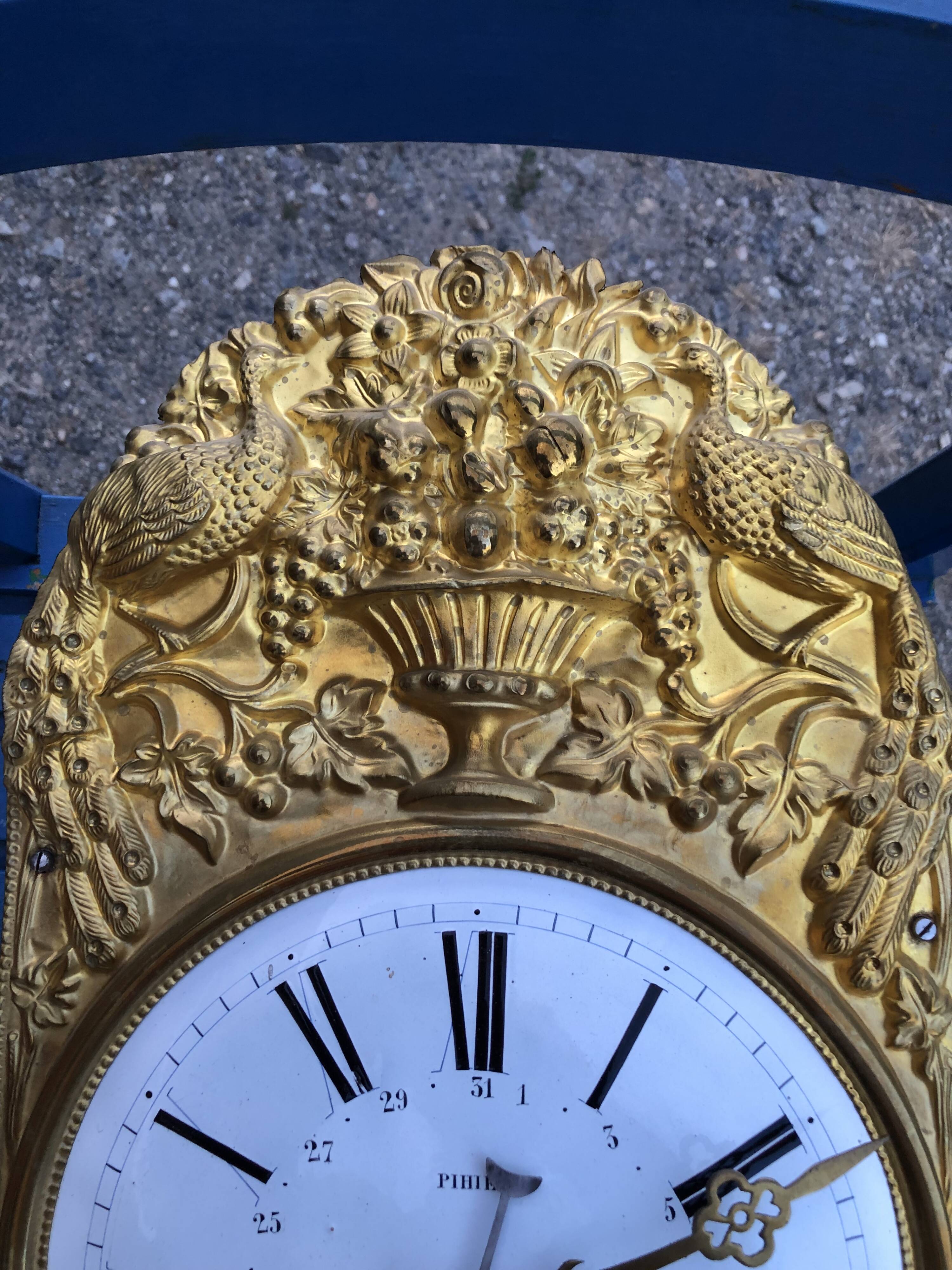 Comtoise clock in cherry style Louis XV period 19th region Fougères.