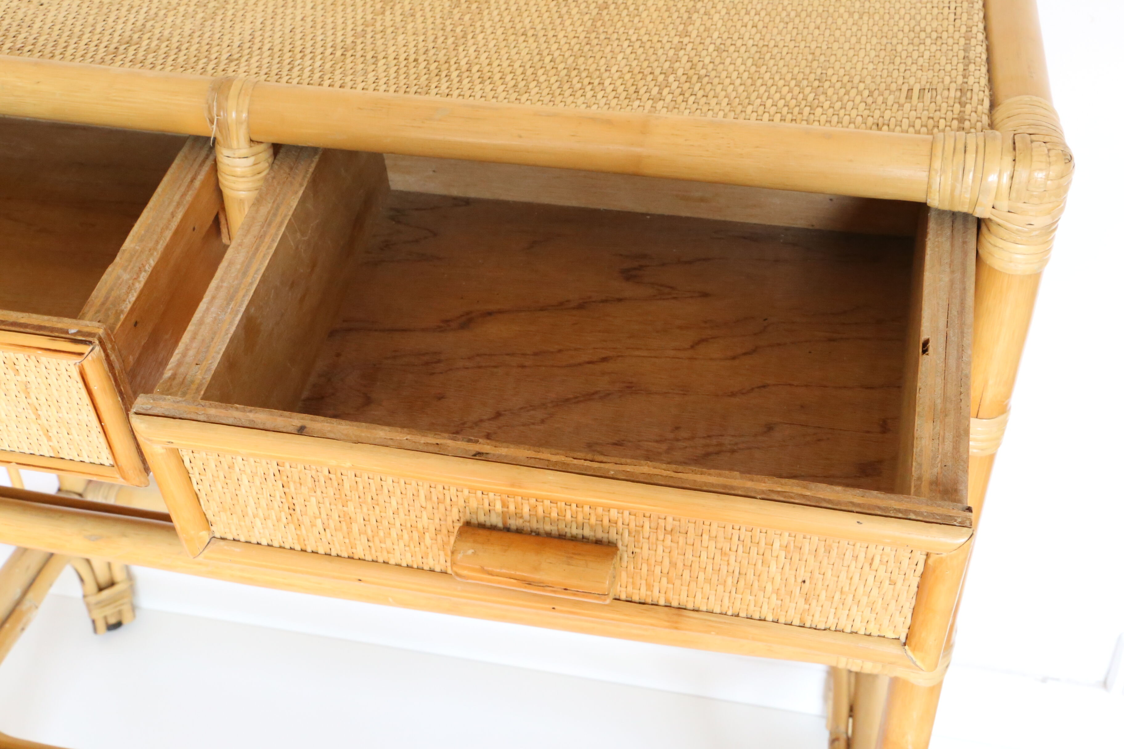 Rattan and wicker console, two drawers